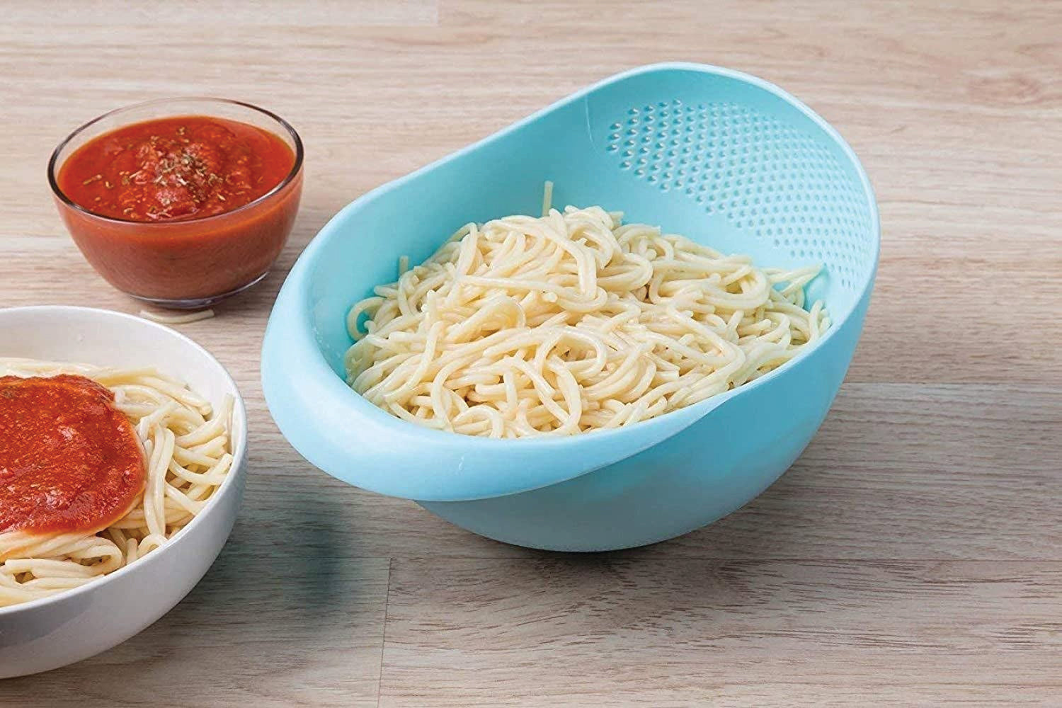 Large plastic rice bowl strainer, ideal for washing and storing grains. Large plastic rice bowl strainer, ideal for washing and storing grains.